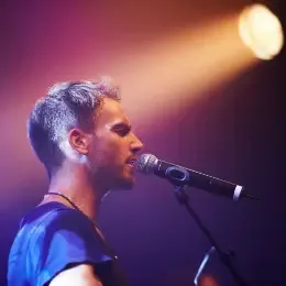 Singer performing for a crowd